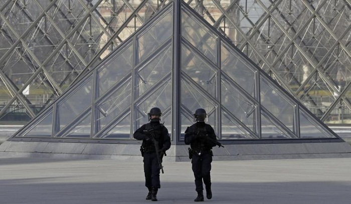 Louvre attacker put under formal detention after condition improves